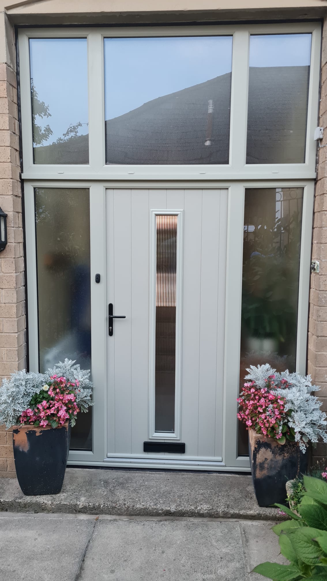 Pebble grey on white Alnwick composite door