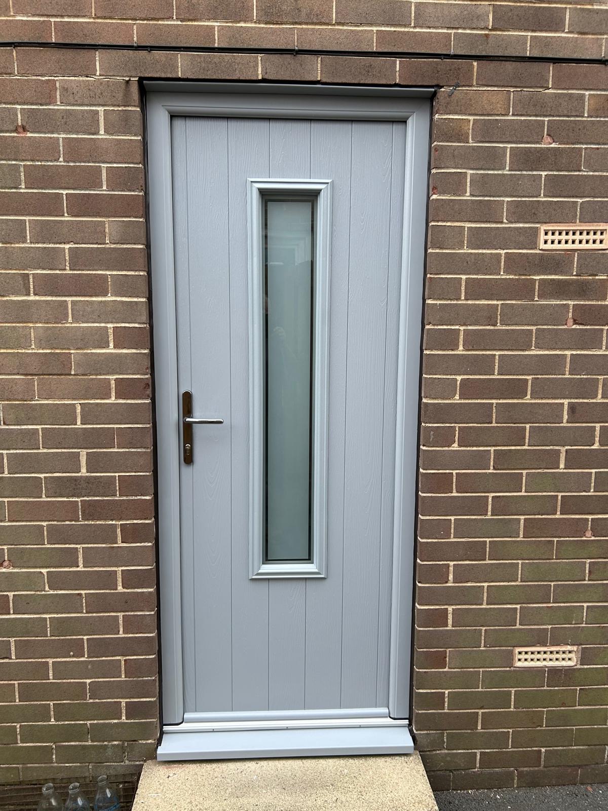 French Grey Flint 5 composite door with Victorian border glass and graphite handle