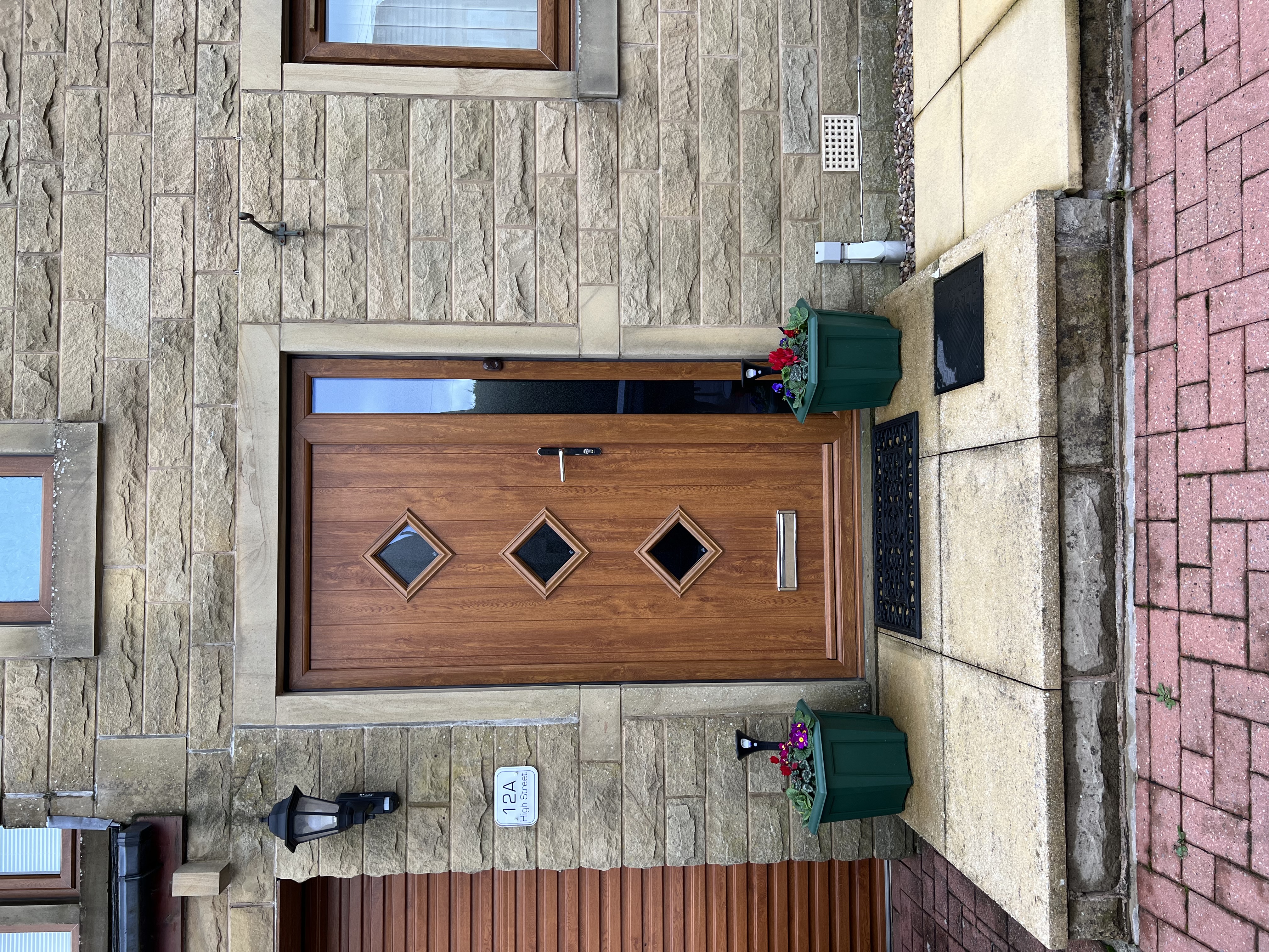 Flint 3 composite door in Oak