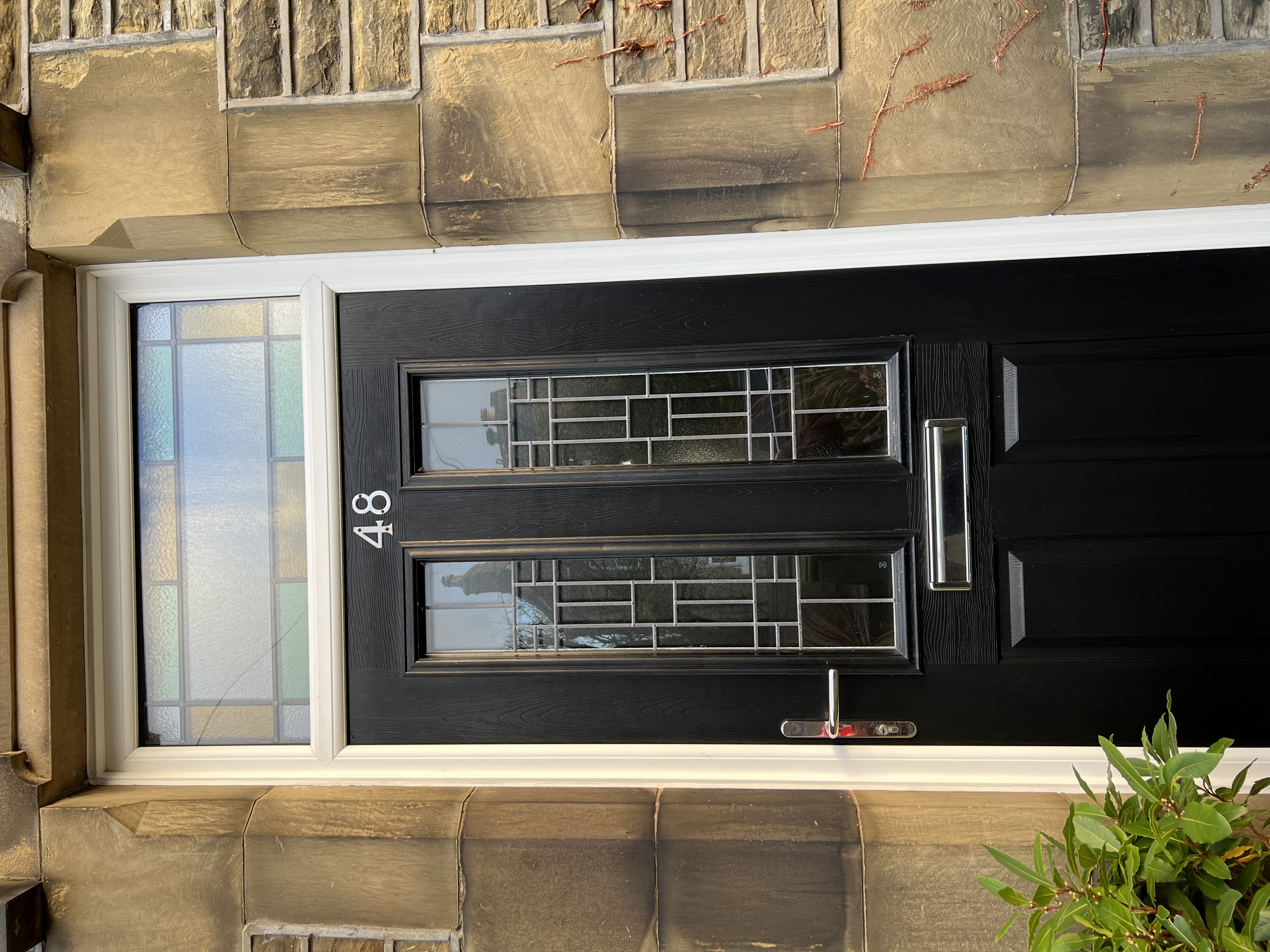 Ludlow composite door in Black with bespoke leaded glass
