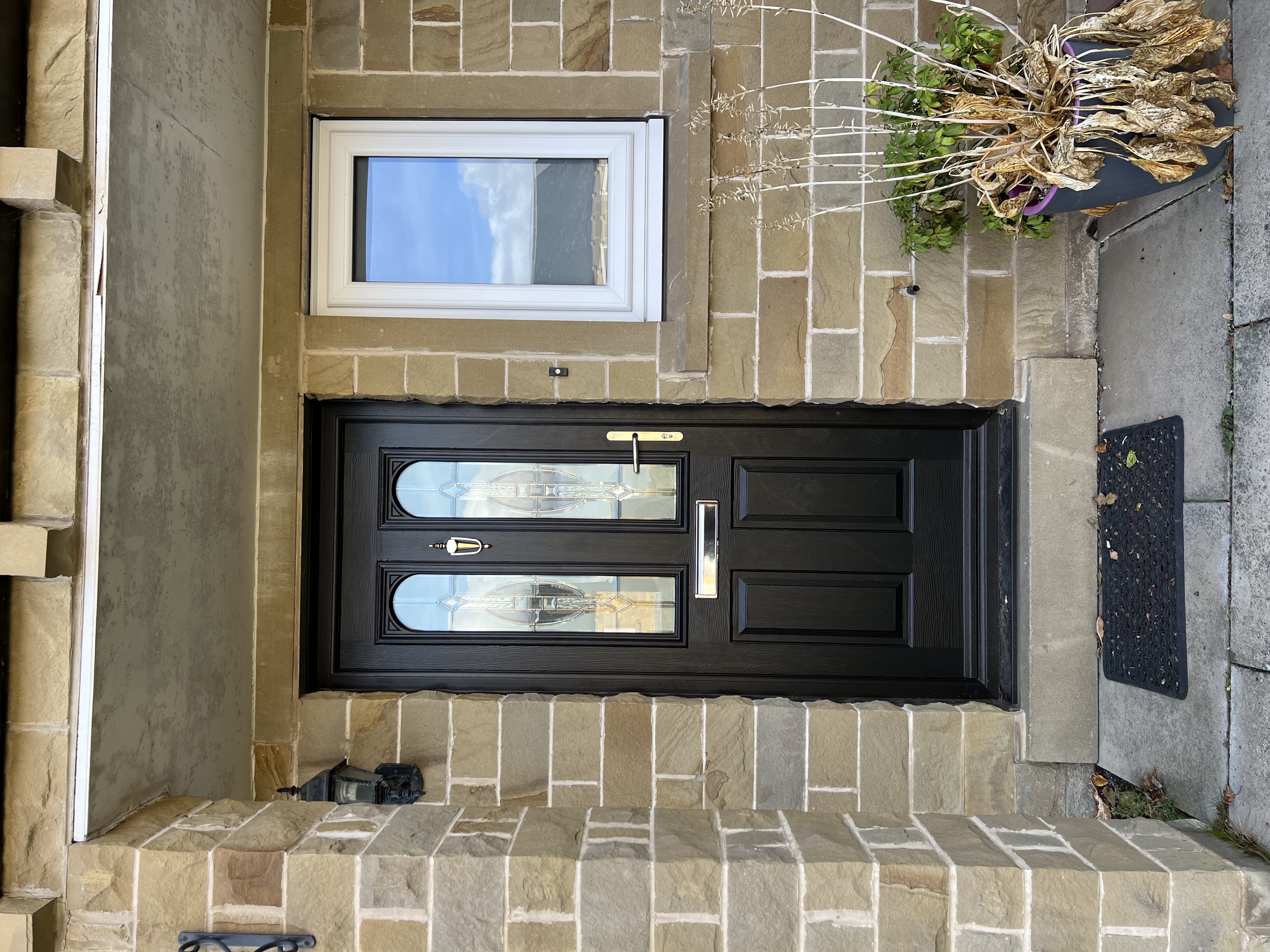 Nottingham composite door in Schwartzbraun with Reflections glass