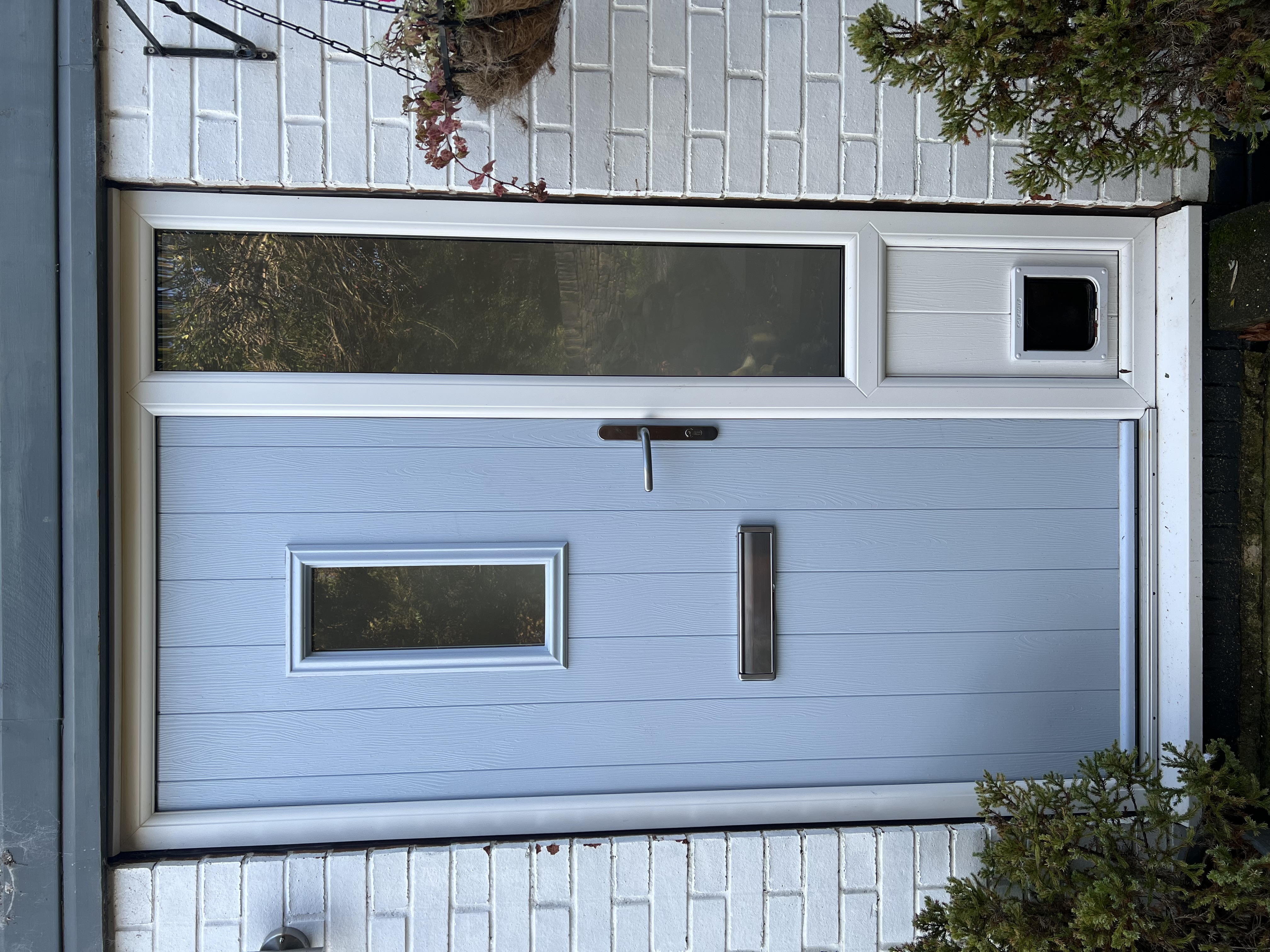 Flint 2 composite door in Duck Egg Blue with White frame and integrated cat flap