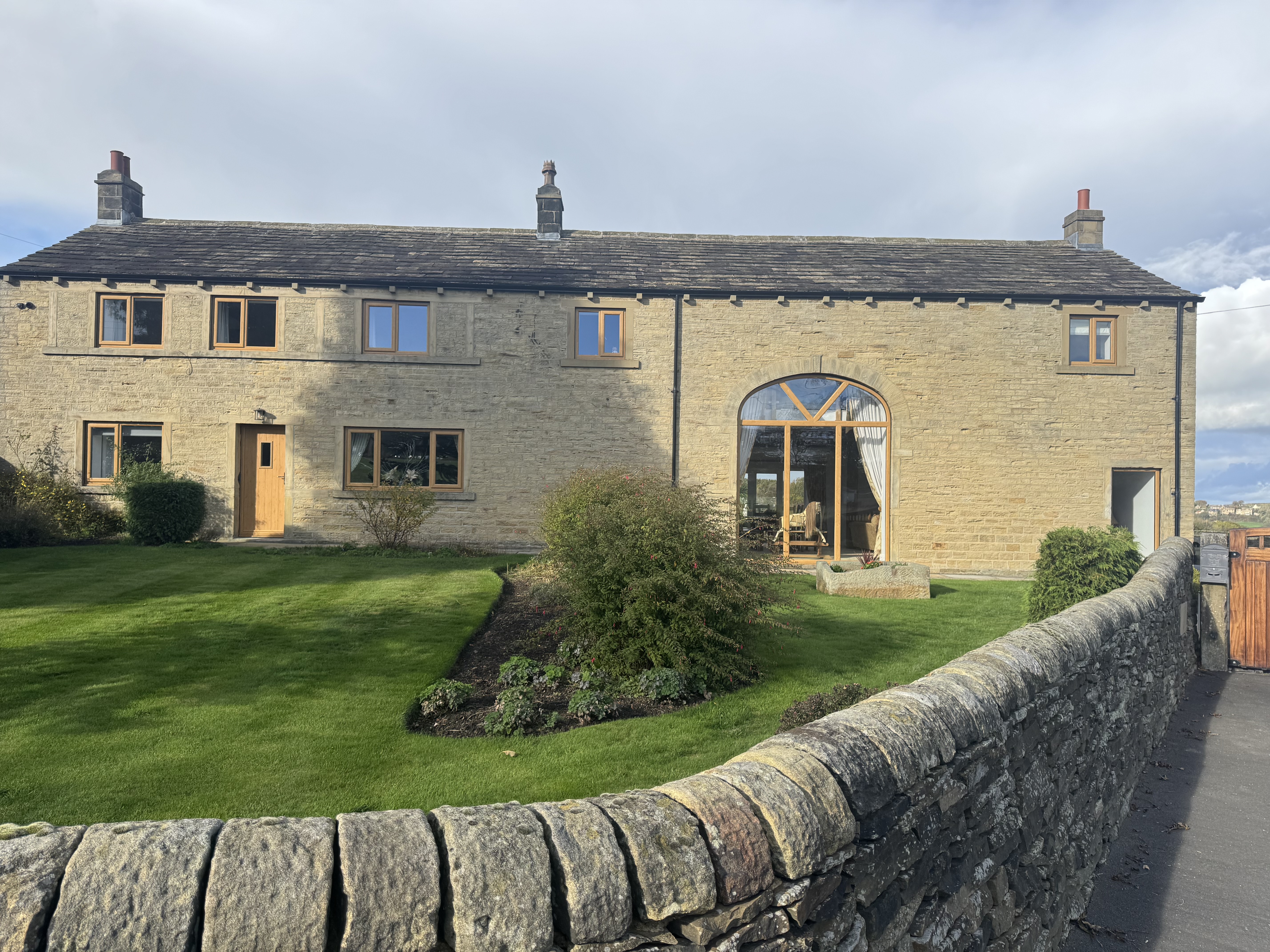 Irish Oak uPVC windows with a Flint 2 composite door