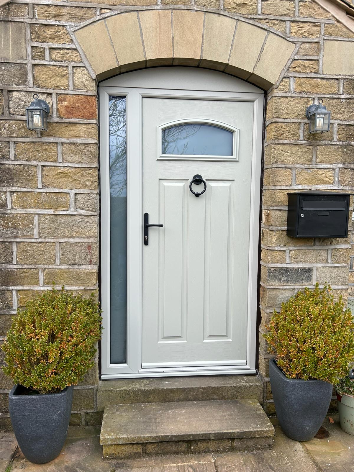 London composite door in Painswick with antique black furniture installed in Helme