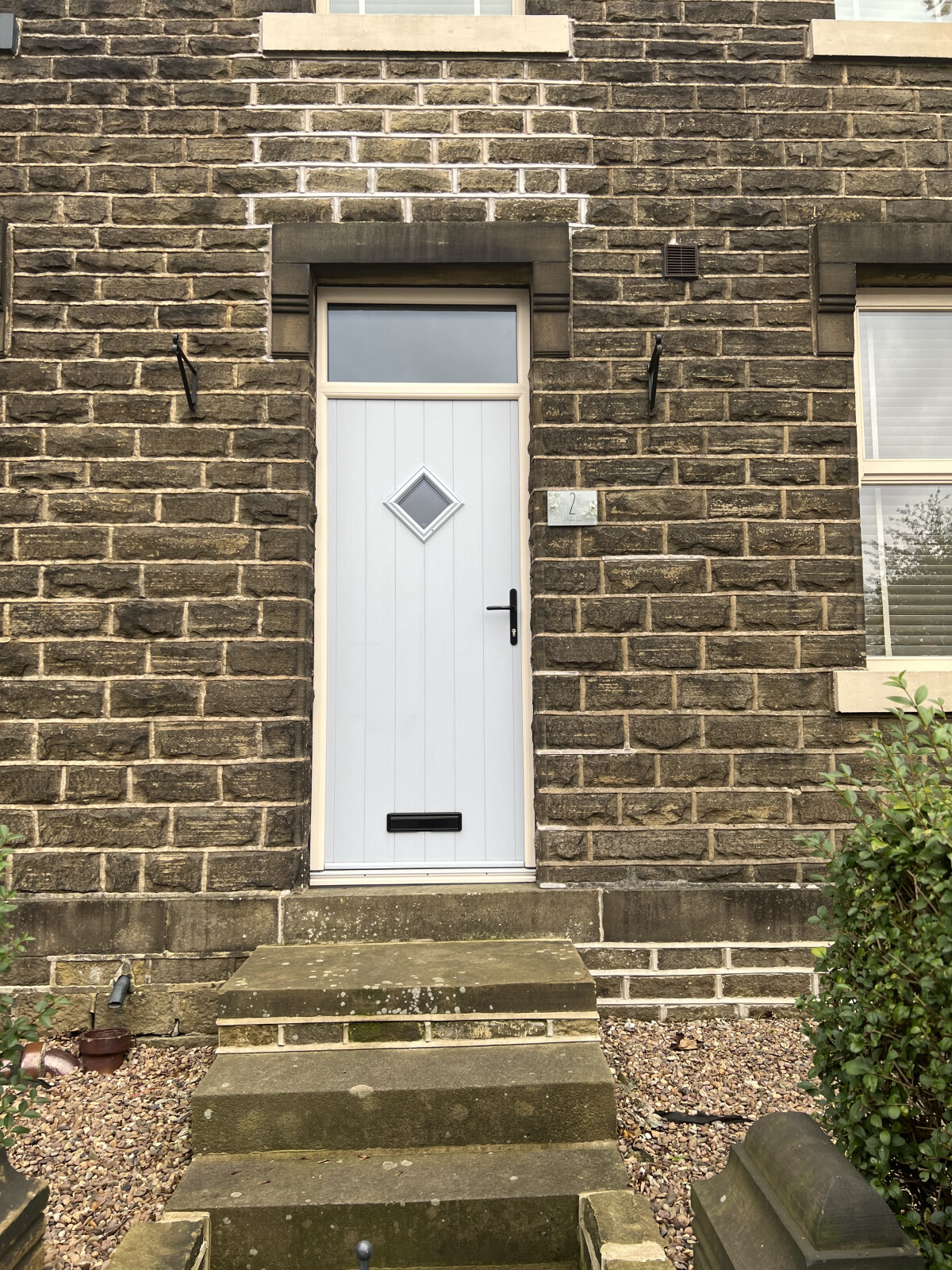 Duck egg blue Flint composite door with Cream frame
