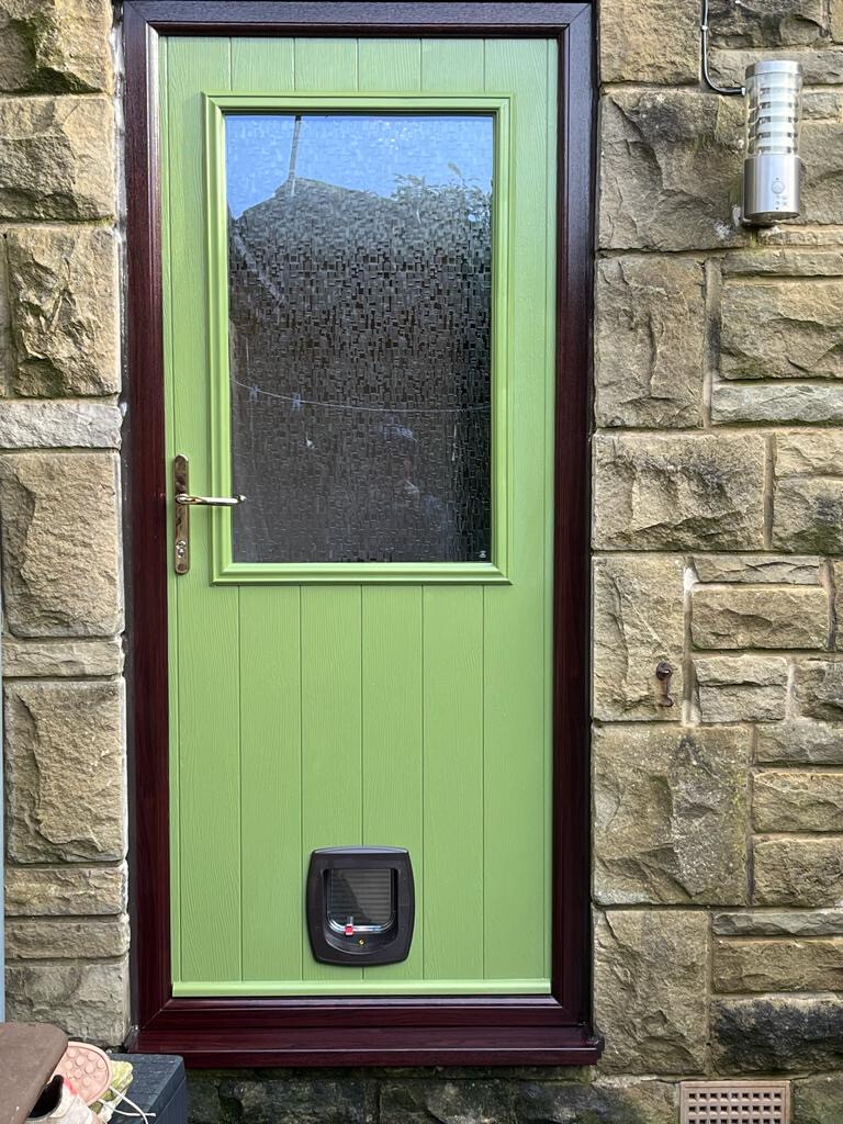 Beeston Flint composite door in Forest Green in a Rosewood uPVC frame.
