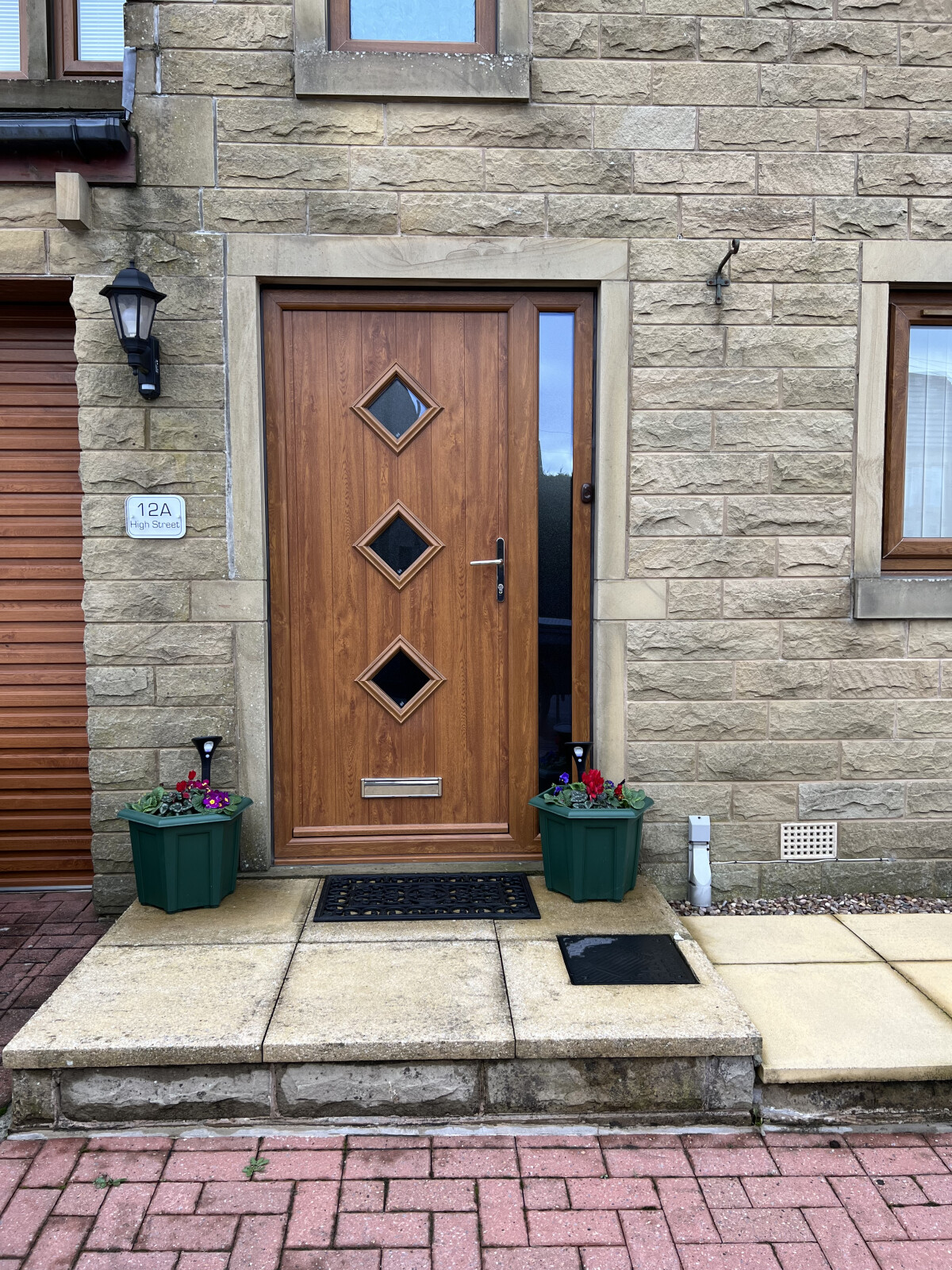 Flint 3 composite door in Oak