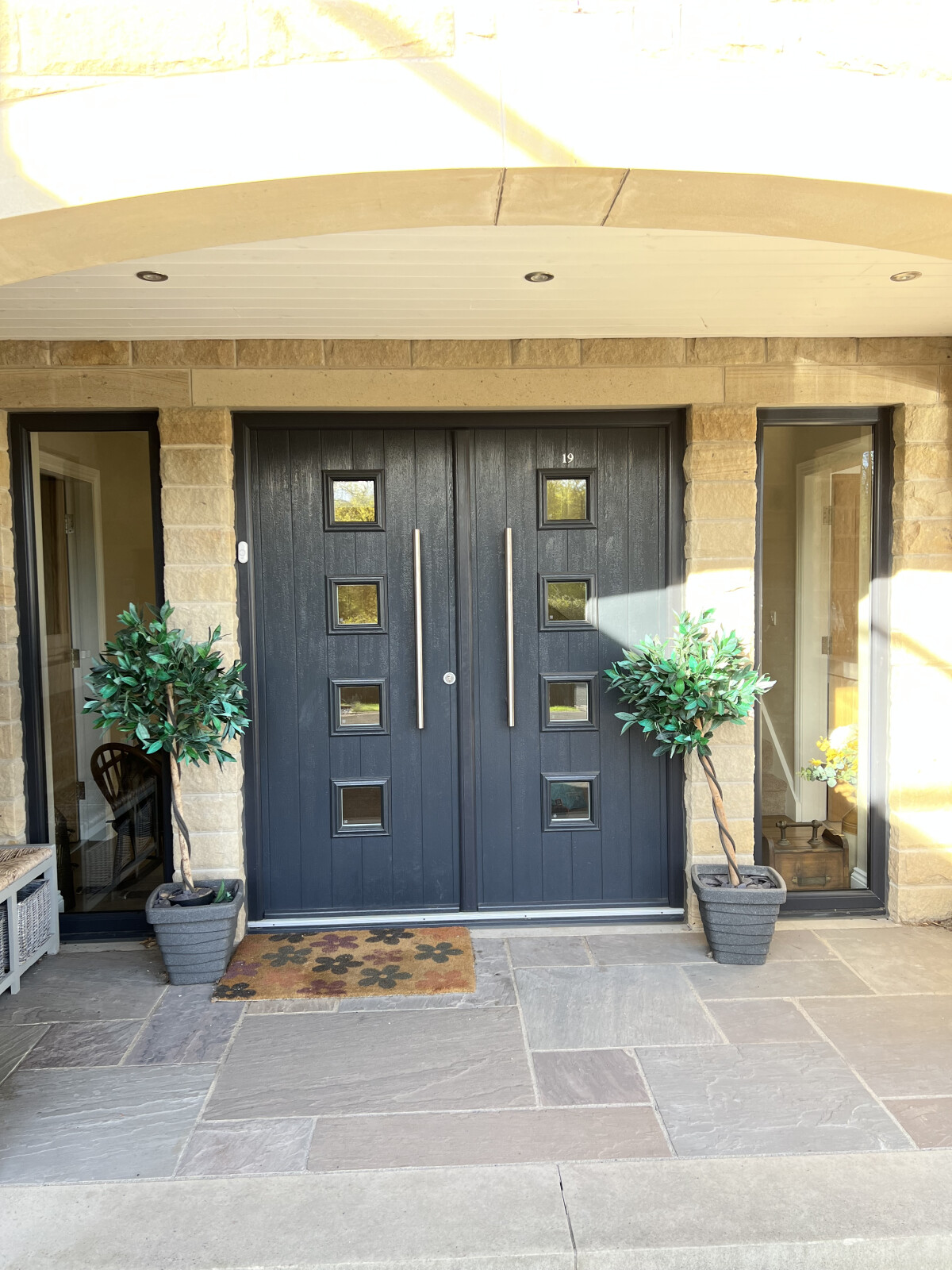 Parma composite French doors in Anthracite Grey with long bar handles