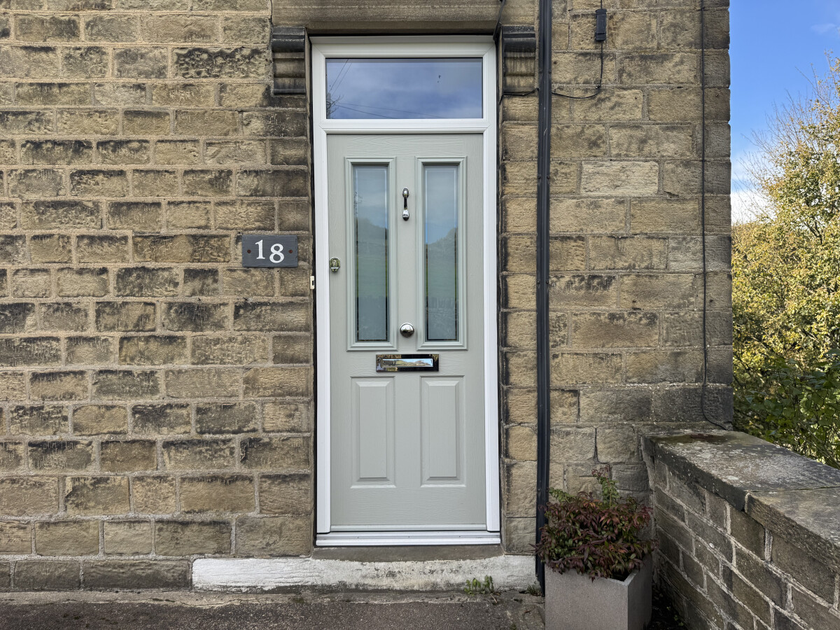 Painswick Ludlow composite door in white frame with Heritage lock, Victorian Border glass, Chrome door knob, Horsetail knocker and architectural letterbox