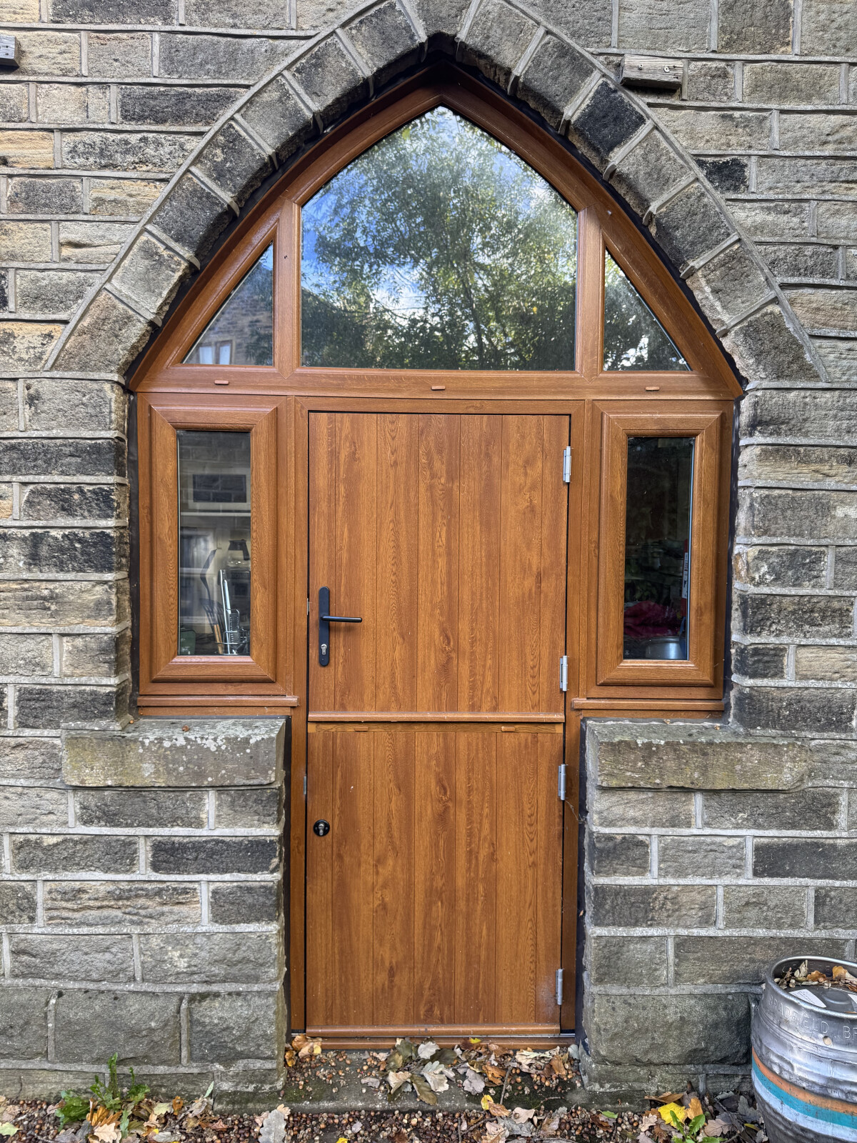 Open out composite stable door in Oak with top and side lights for Hepworth Village Hall