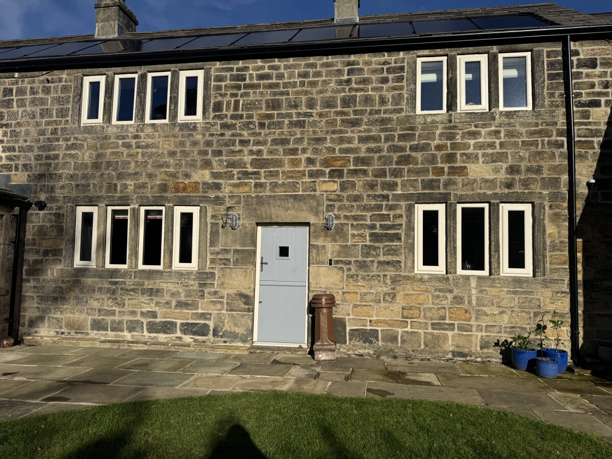 French Grey Flint 1 composite stable door in cream frame with clear glass and Avon pewter handle