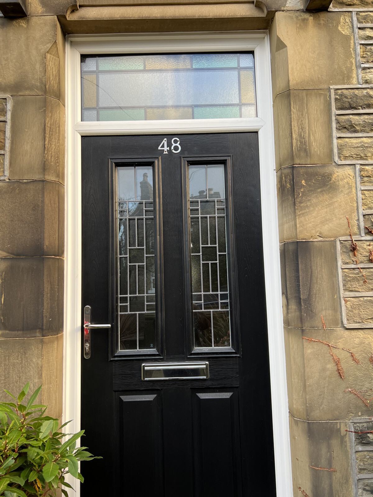 Ludlow composite door in Black with bespoke leaded glass
