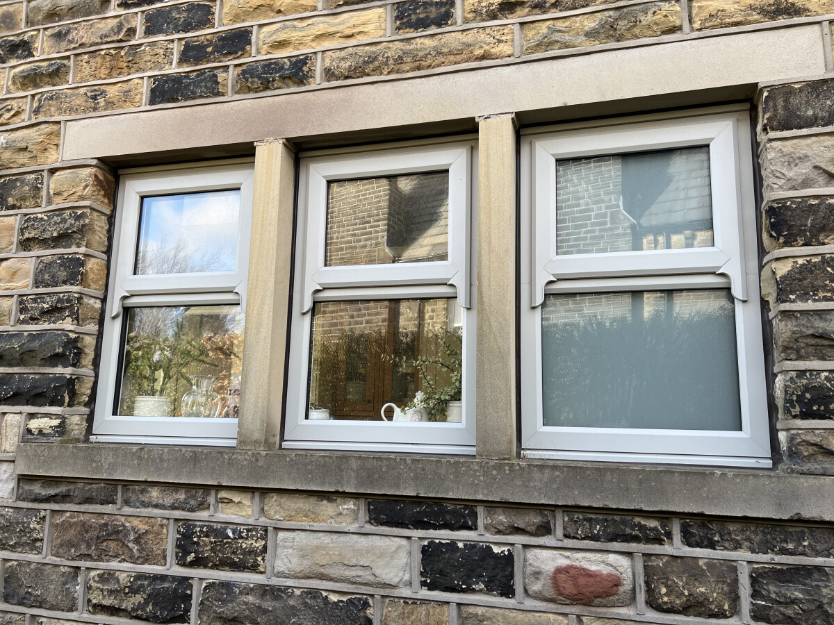 uPVC windows with sash horns in painswick
